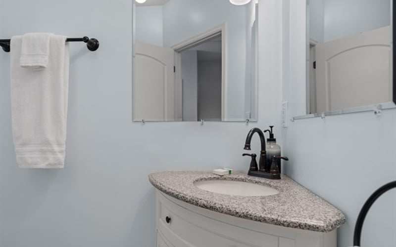 Bathroom vanity in convenient main level ensuite.