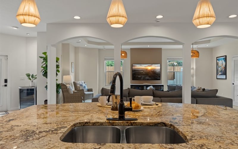 Gather at the expansive bar and savor cooking in a fully equipped, spacious kitchen.