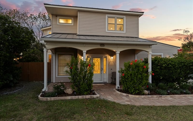 Nighttime view of the front of the house