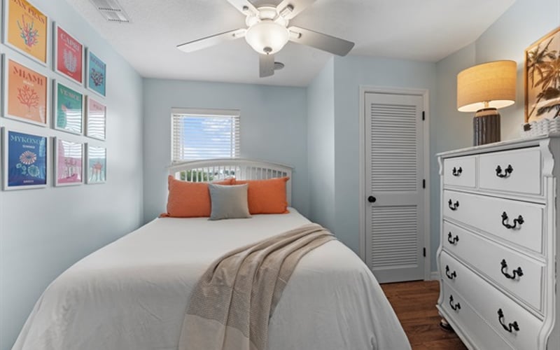 Upstairs Bedroom #2 with queen bed, dresser and closet