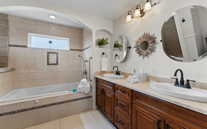 Master ensuite bathroom with dual sinks for added convenience
